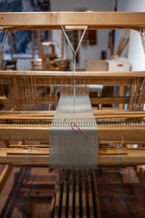 close-up high resolution shot of a spinning loom. handloom Textile production and products....