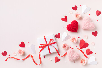 Valentine day or mother day festive composition with gift or present box, rose flowers and red...