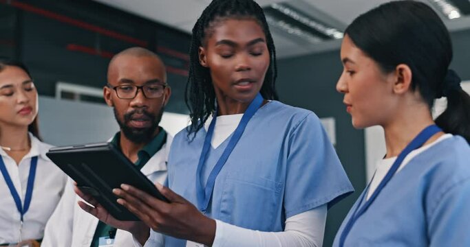 Medical team, tablet and discussion in a hospital with doctor, meeting and planning at work. Healthcare, nursing and health support staff with tech, management and communication together in a clinic