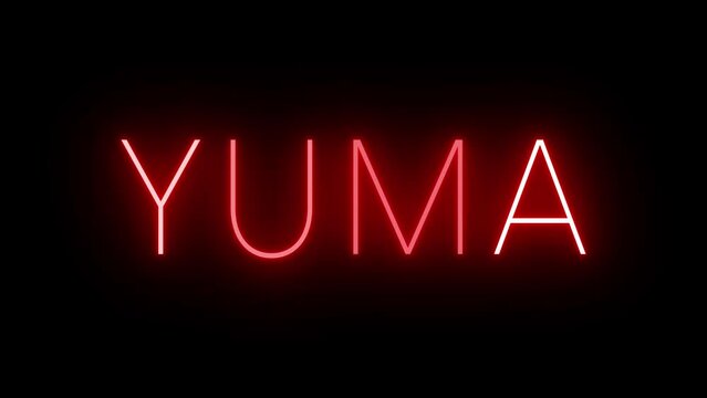 Flickering red retro style neon sign glowing against a black background for YUMA