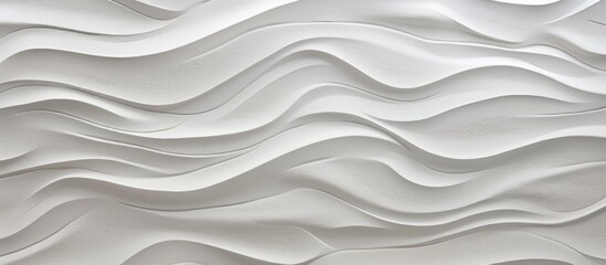 Artistic adornment of grey and white recycled paper with a wrinkled, shiny texture.