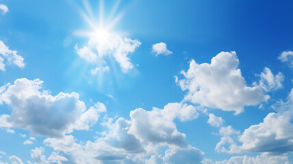 Naklejka na ściany i meble in the blue sky bright sun and light clouds wide photo