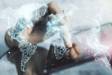 Multi exposure of abstract creative digital world map and finger presses on a digital tablet on background, tourism and traveling concept