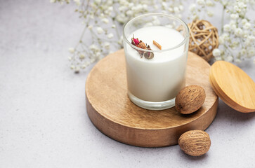 Aromatic candle on the table.