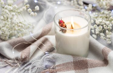 Aromatic candle on the table.