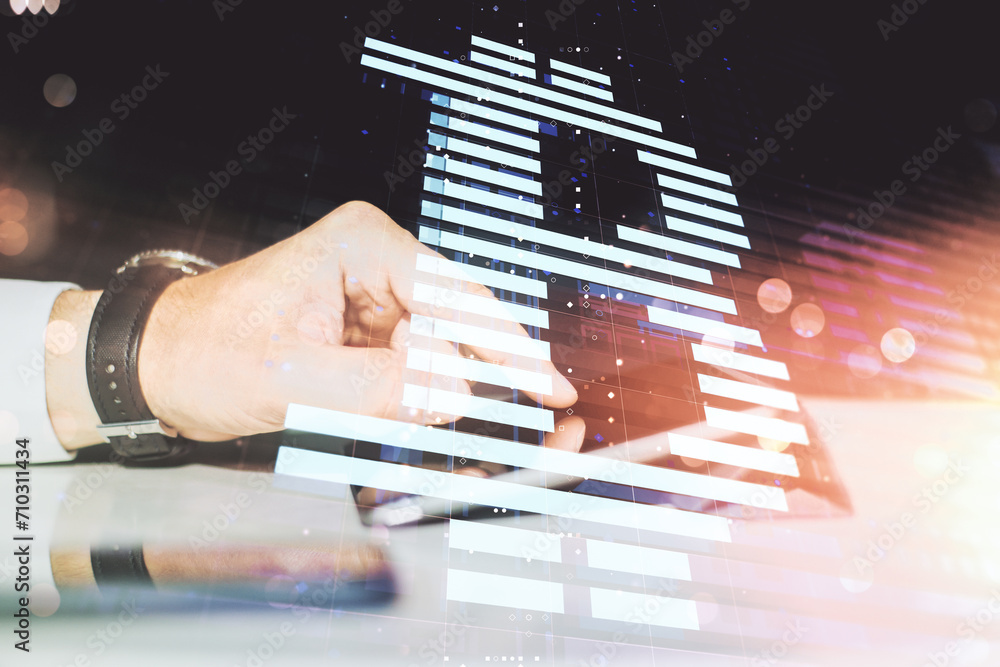 Poster double exposure of creative bitcoin symbol hologram and hand working with a digital tablet on backgr