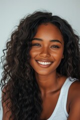 Photo of beautiful black woman smiling and having in studio shot