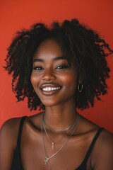 Photo of beautiful black woman smiling and having in studio shot