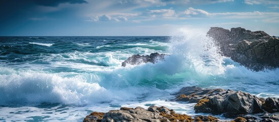 Crashing waves on rocks in the ocean.
