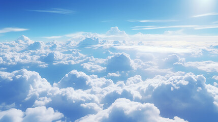 Fototapeta na wymiar beautiful white fluffy clouds and blue sky from airplane window view