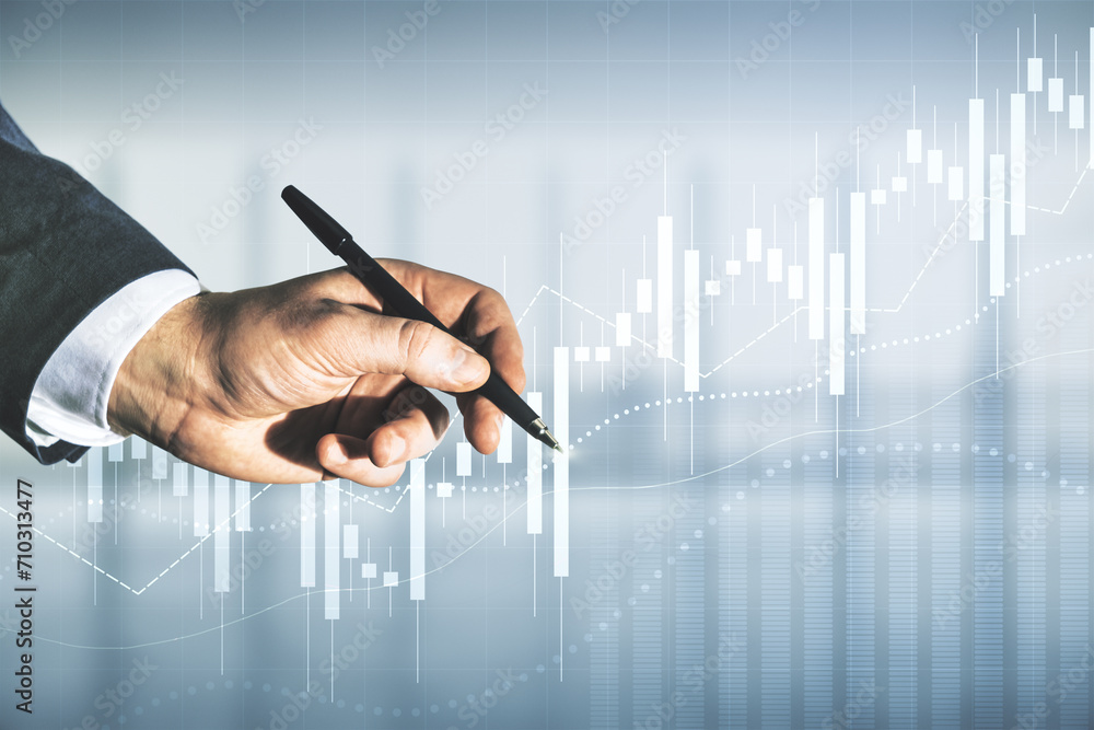 Poster multi exposure of trader hand with pen working with virtual abstract financial graph interface on bl