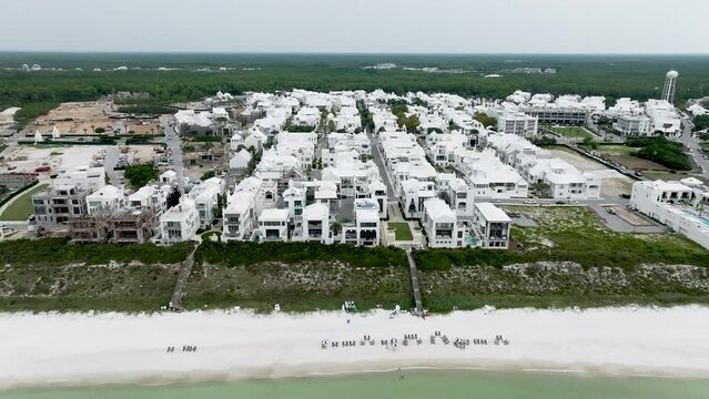 Alys beach town reel slow cinematic white houses next to ocean on daylight