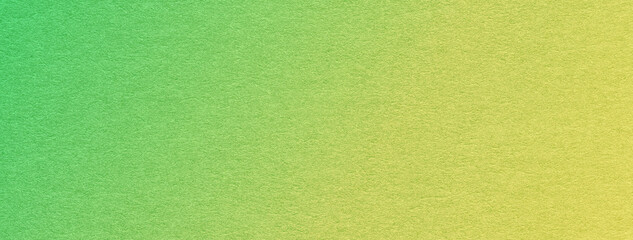 Texture of old light green and yellow paper background, with holographic gradient. Structure of...