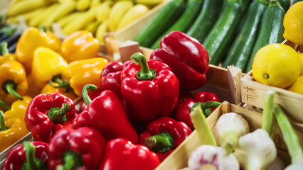 Close Up Shot with a Selection of Fruits and Vegetables Being Sold on a Food Stand at a Farmers Market. Local Small Business Stall with Organic Tomatoes, Bananas, Mangos, Eggplants, Peppers
