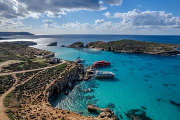 Fototapeta na wymiar Aerial drone beautiful sunny view of Blue Lagoon in Comino Island, Gozo Island, Malta
