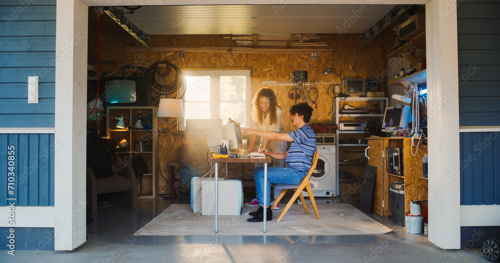 Aufkleber caucasian male software developer and hispanic female designer talking and using old desktop compute