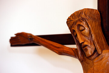 Wood statue of Jesus on the cross. The crucifixion.  Annecy. France.