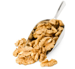 walnuts on a metal scoop, front view, on a white isolated background