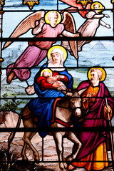 Saint Aubin church.  Stained glass.  The Flight into Egypt. Holy Family.  Houlgate. France.