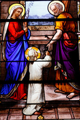 Saint Aubin church.  Stained glass. Holy Family. Joseph the carpenter. Houlgate. France.