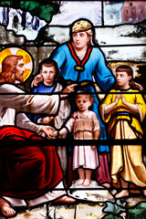 Saint Aubin church.  Stained glass. Let the Little Children Come to me. Jesus. new testament.  Houlgate. France.