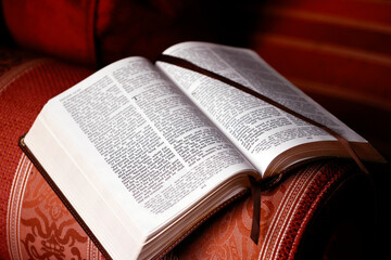Fototapeta premium Bible study. Open bible on a chair.