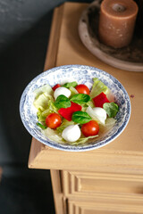 salad with mozzarella , cherry tomatoes and herbs