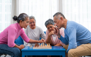 Senior old man and woman playing chess game on chess board for strategy, Elderly people playing...