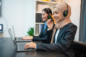Friendly smiling woman call center operator with headset using computer, Customer service, Call...