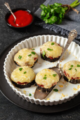 mini eggplant pizzas with tomato sauce and cheese