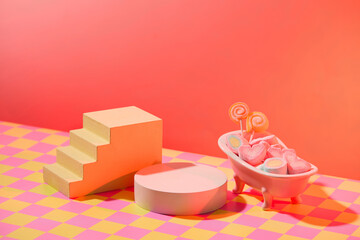 Valentine’s day holiday background with empty podiums decorated with mini ceramic bathtub full with sweet marshmallow and candy. Blank space for displayed product