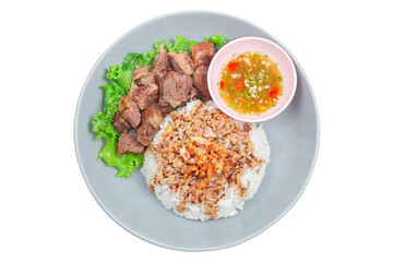 Stewed beef with rice on plate
