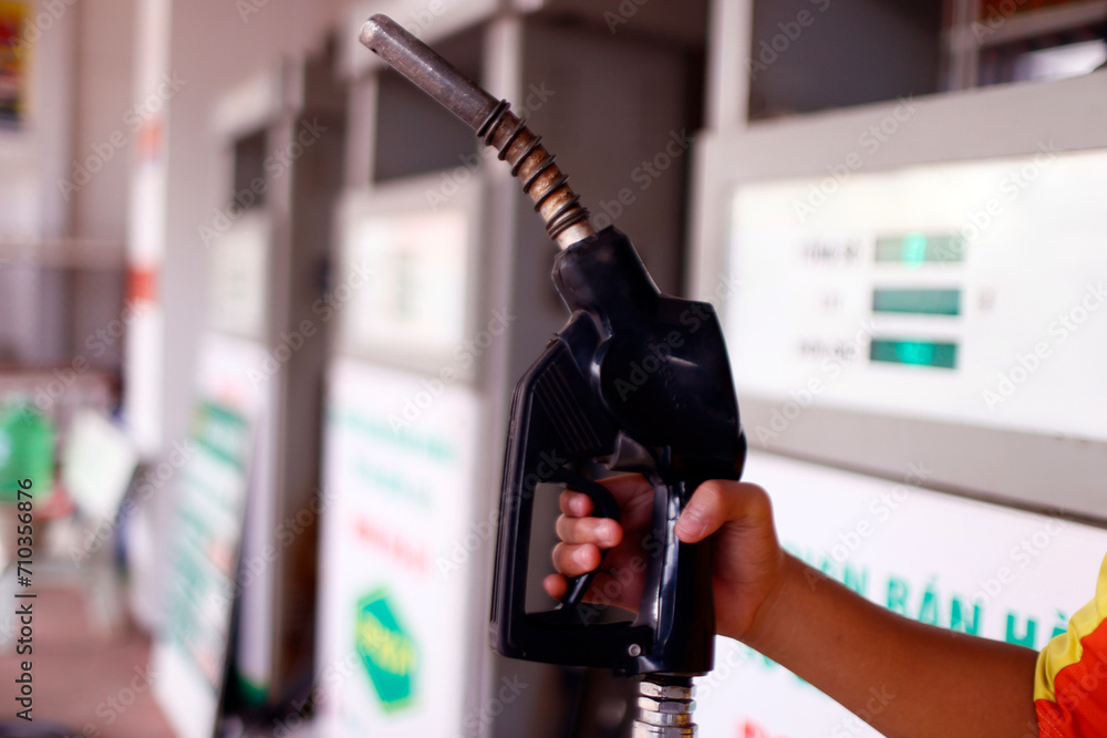 Poster gas station. motorcyclist at a filling station buying, petrol, gasoline, fuel.