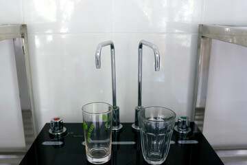 Glasses of water from filter tap. .