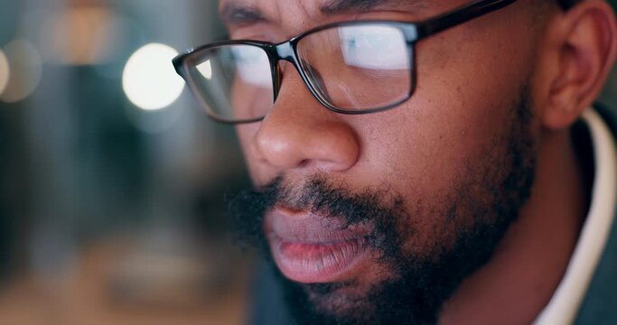 Man, graphic designer and glasses for night research, creative vision or planning on computer in reflection. African worker reading, watch or vision with eye care for website design or online project