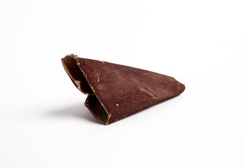 Old Brown Folded Sandpaper Scratching And Wood Finishing Concept Closeup Photo On White Background