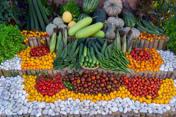 Closeup with top view, Vegetables, and Fruits patterns. Decorate with many types of vegetables and fruits. Nature vibrant fruits including tomatoes decorate the background.