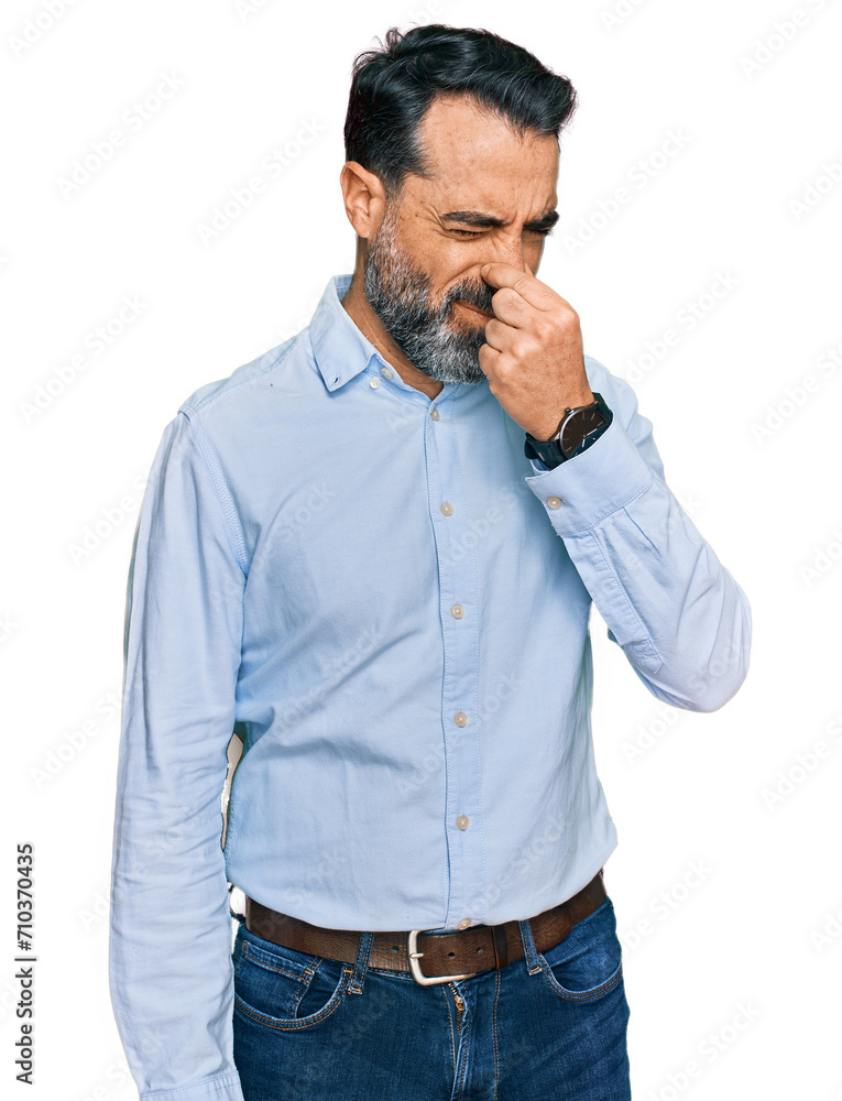 Sticker middle aged man with beard wearing business shirt smelling something stinky and disgusting, intolera