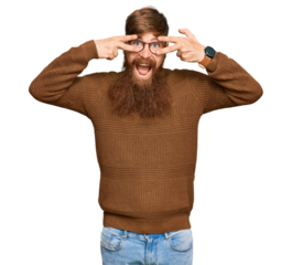 Young irish redhead man wearing casual clothes and glasses doing peace symbol with fingers over face, smiling cheerful showing victory