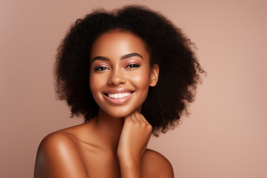 Portrait of young beautiful black African American woman with perfect smooth skin beauty spa salon concept, Close up, Smile, look at camera, touching her face, Isolated background, cosmetics model