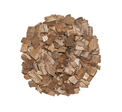 top view flat lay pile of french oak wood chip for smoking meat and fish isolated on white background.
