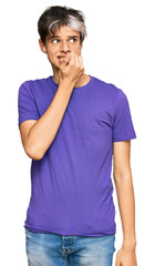 Fototapeta na wymiar Young hispanic man wearing casual clothes looking stressed and nervous with hands on mouth biting nails. anxiety problem.
