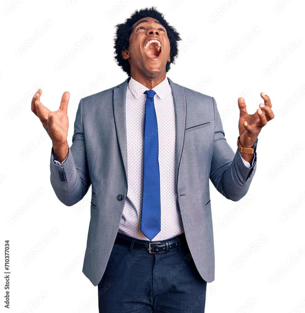 Wall mural handsome african american man with afro hair wearing business jacket crazy and mad shouting and yell