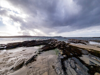 The rocks of Carrickfad by Portnoo at Narin Strand in County Donegal Ireland