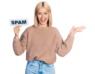 Beautiful young blonde woman holding spam banner celebrating victory with happy smile and winner expression with raised hands