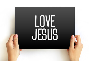 Love Jesus text on card, concept background