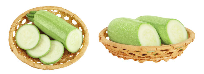 zucchini or marrow in a wicker basket isolated on white background with full depth of field. Top...