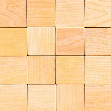 Wall, empty background of sixteen wooden cubes. copy space.