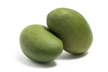 Two fresh organic green mango delicious fruit side view isolated on white background clipping path