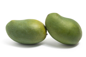 Two fresh organic green mango delicious fruit side view isolated on white background clipping path